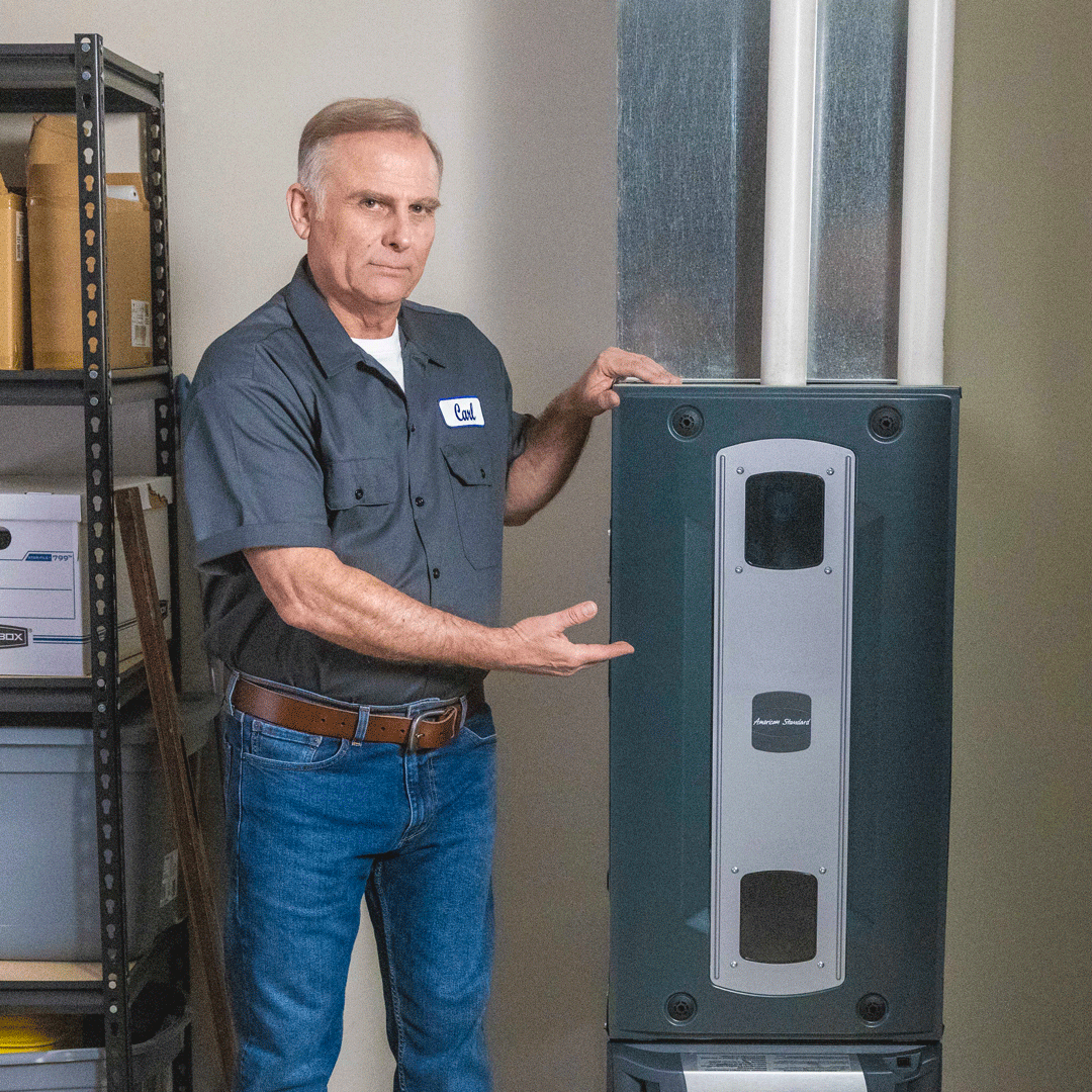 American Standard furnace system installed in a utility area